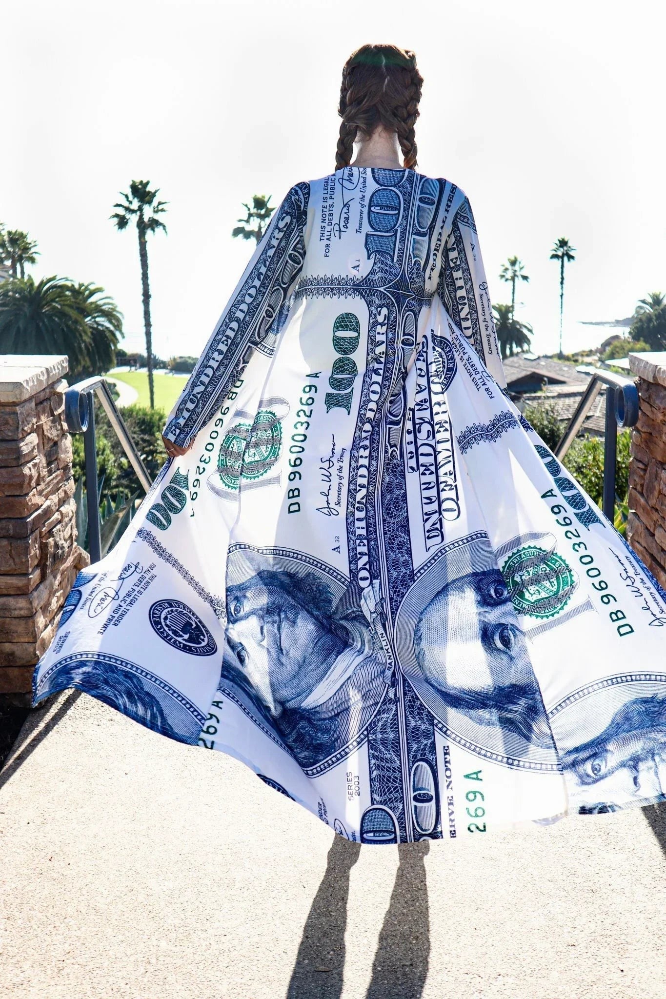SlaySwimwear Benjamin Franklin 100 dollar bill print long sleeve maxi dress with braided hair. Model is 5'7" and wears a small.