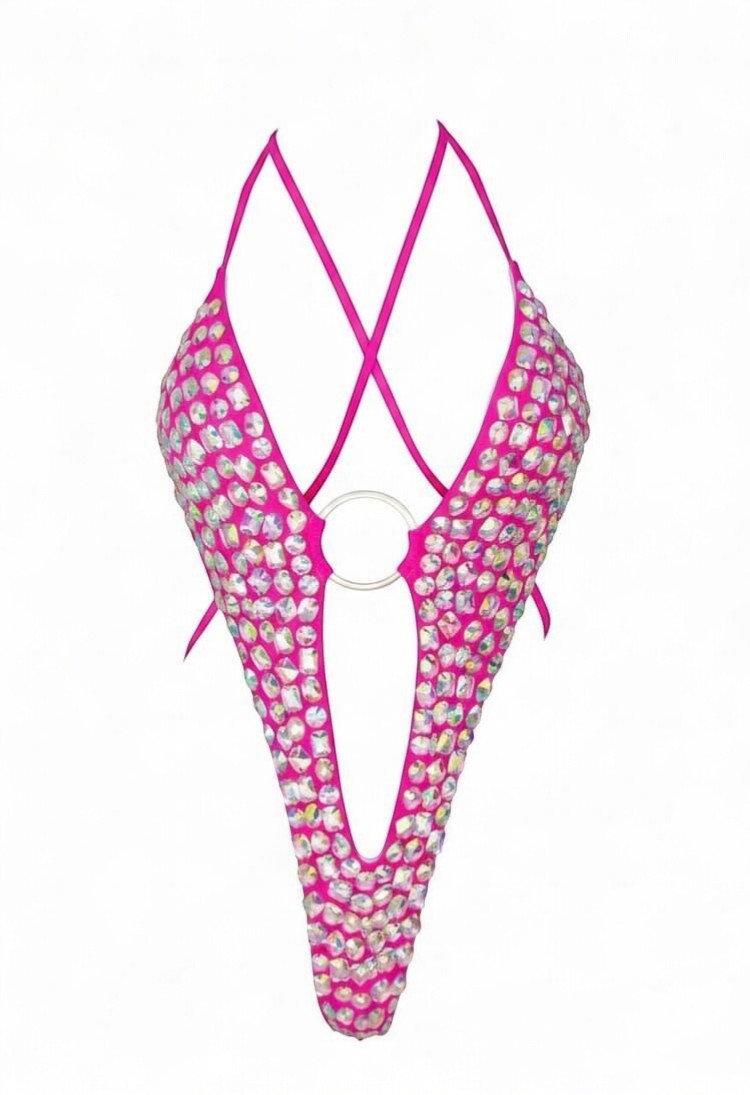 SlaySwimwear hot pink one-piece bikini with all-over rhinestones and silver ring detail. Features a plunging neckline and criss-cross straps.