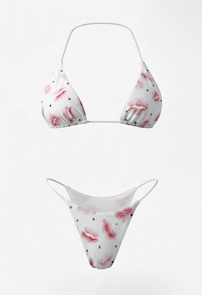 SlaySwimwear white string bikini with pink kiss print and black polka dots. Adjustable ties for custom fit.