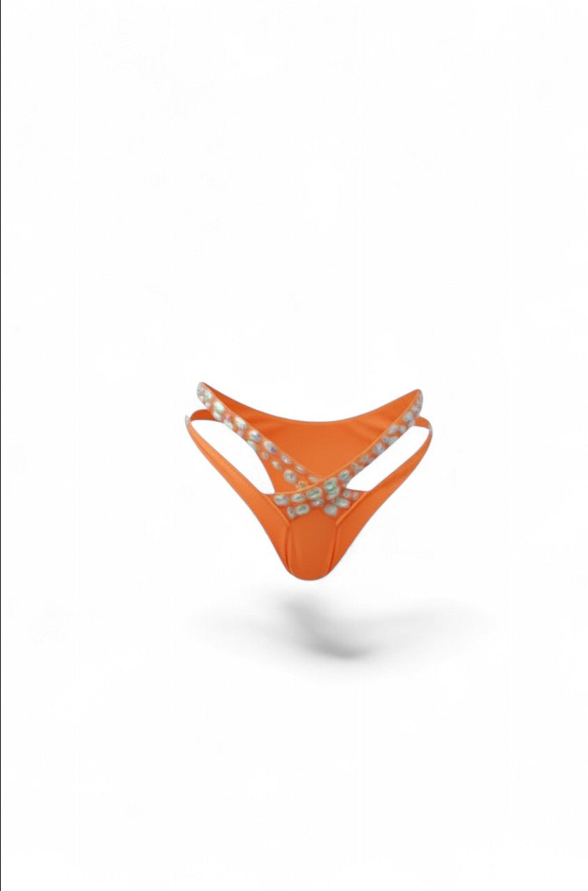 SlaySwimwear orange sparkling rhinestone bikini set with halter top and cheeky bottoms featuring cut-out details.