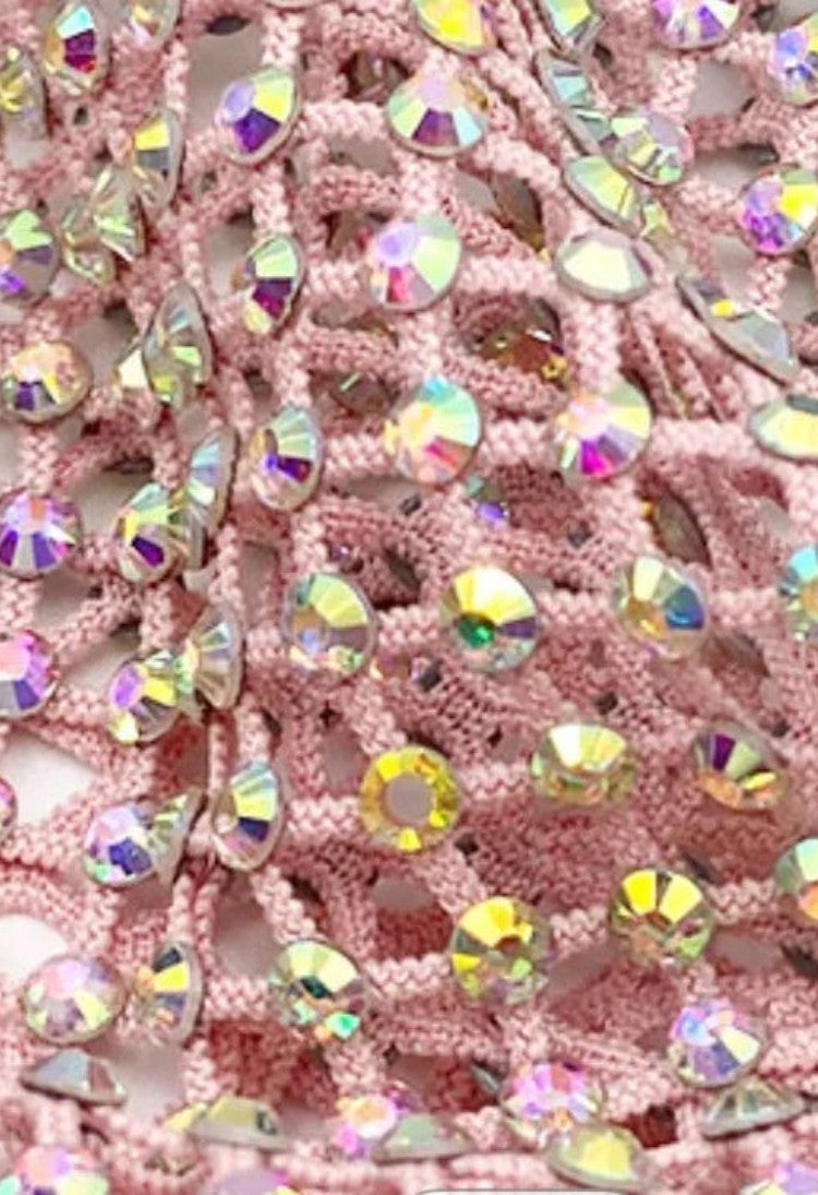 SlaySwimwear pink crochet mini skirt adorned with iridescent rhinestones and a rhinestone clasp closure.