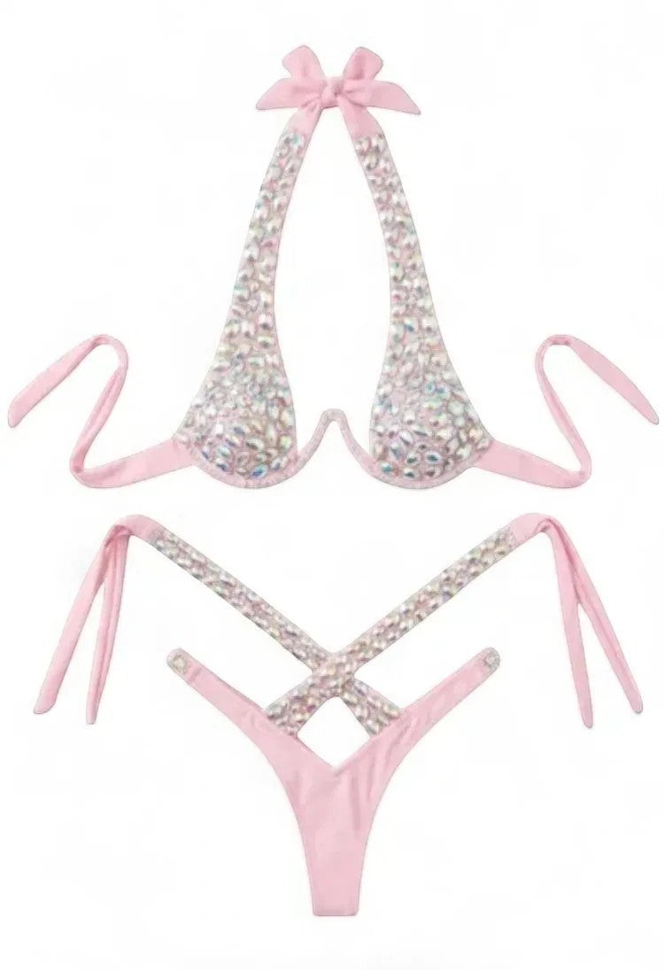 SlaySwimwear pink halter bikini set with sparkling embellishments and criss-cross detailing on bottom.