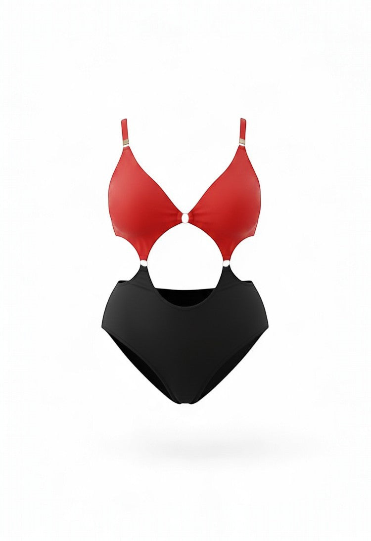 SlaySwimwear Queen of Hearts red and black one-piece swimsuit with cut-outs and gold ring details. Made of nylon and spandex.