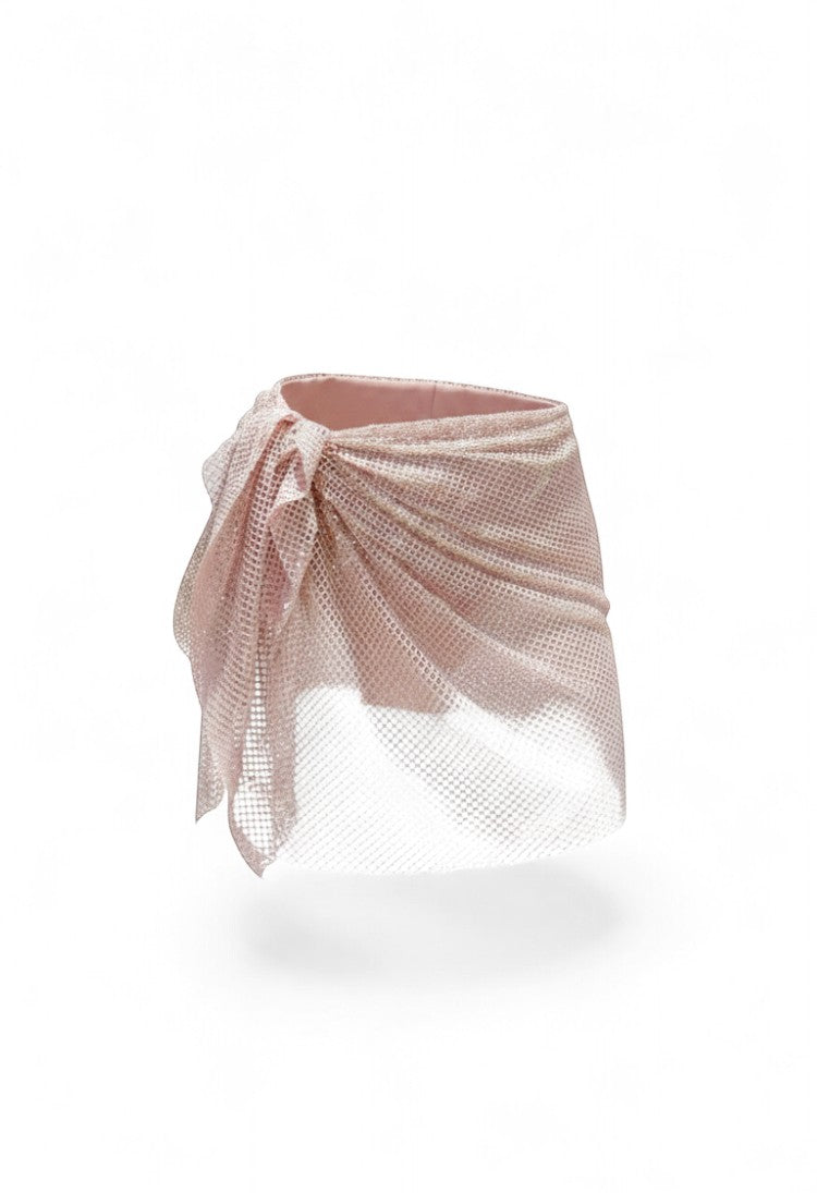 SlaySwimwear rose gold mesh mini skirt with all-over rhinestone embellishment and clasp closure.