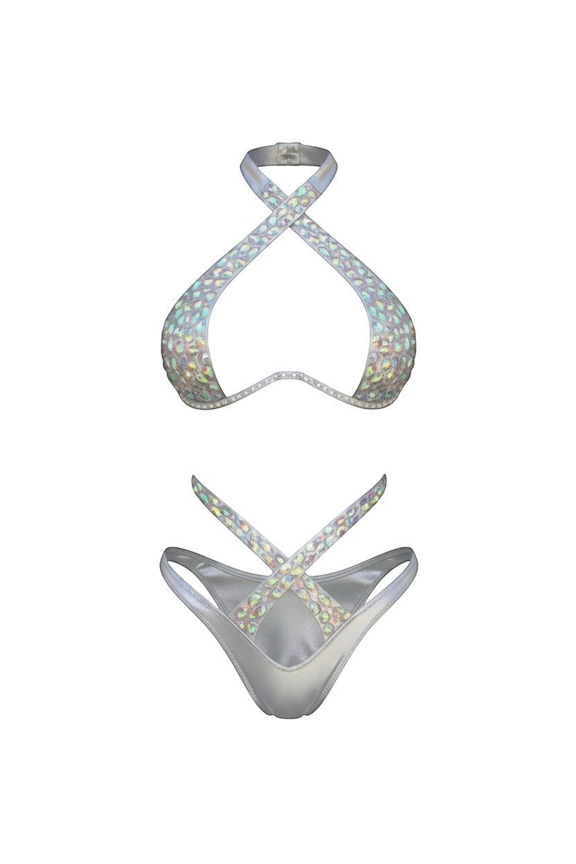 SlaySwimwear silver rhinestone bikini with plunging halter top and high-cut cheeky bottoms.