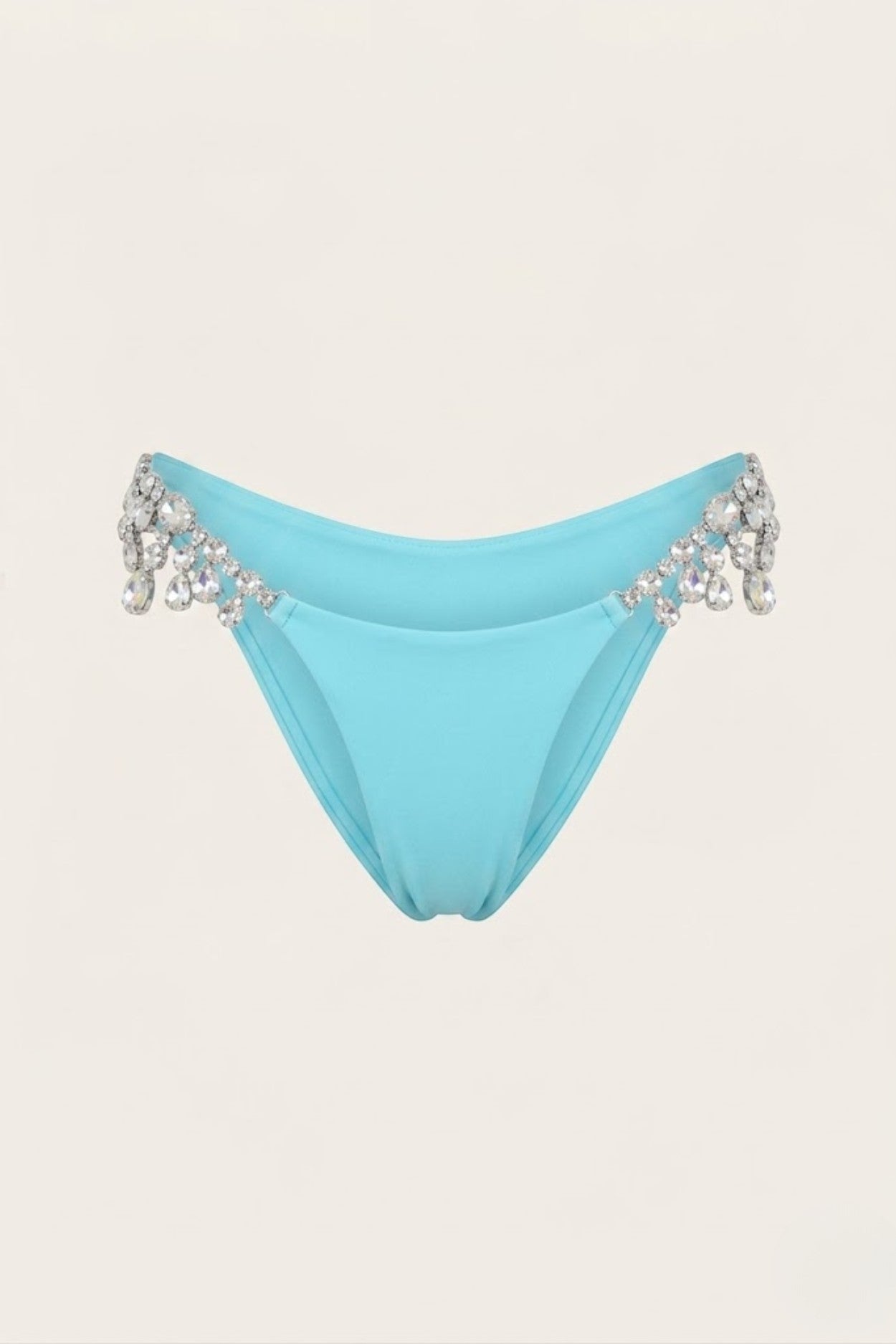 SlaySwimwear turquoise bikini bottoms with sparkling rhinestone embellishments on the sides.