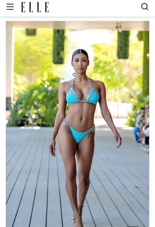 SlaySwimwear Ocean Vibes turquoise bikini set with rhinestone embellishments on halter top and sides of bottoms. Model wears a small.