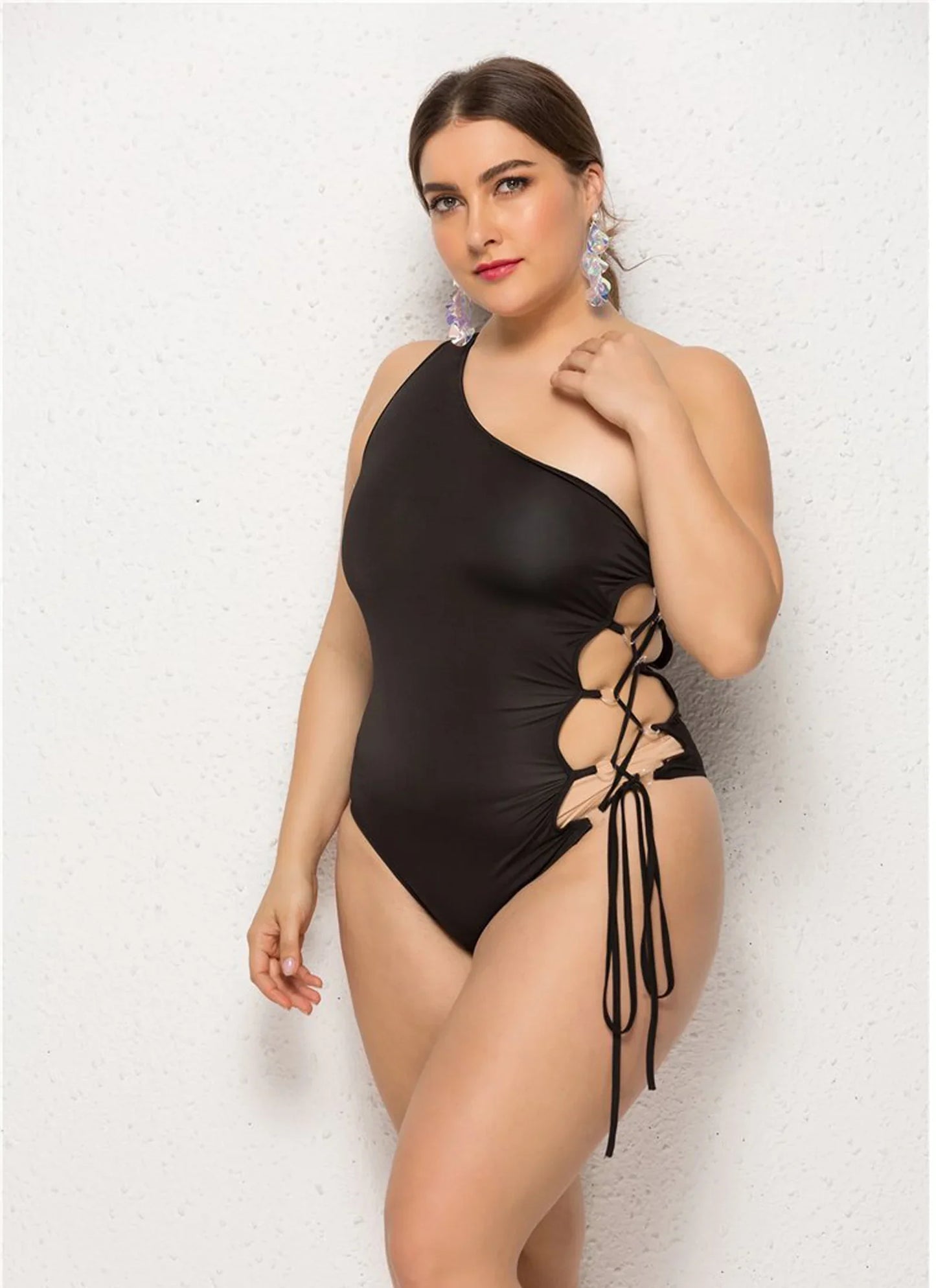 Model wearing Slay Swimwear Yas, Queen One Piece Swimsuit