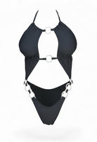 SlaySwimwear black one-piece swimsuit with adjustable straps adorned with rhinestone rings. Features a plunging neckline and high-cut legs.