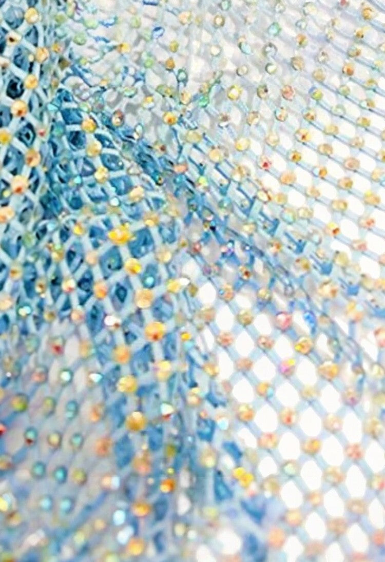 SlaySwimwear blue durag with all-over crystal embellishments and a diamond net pattern.