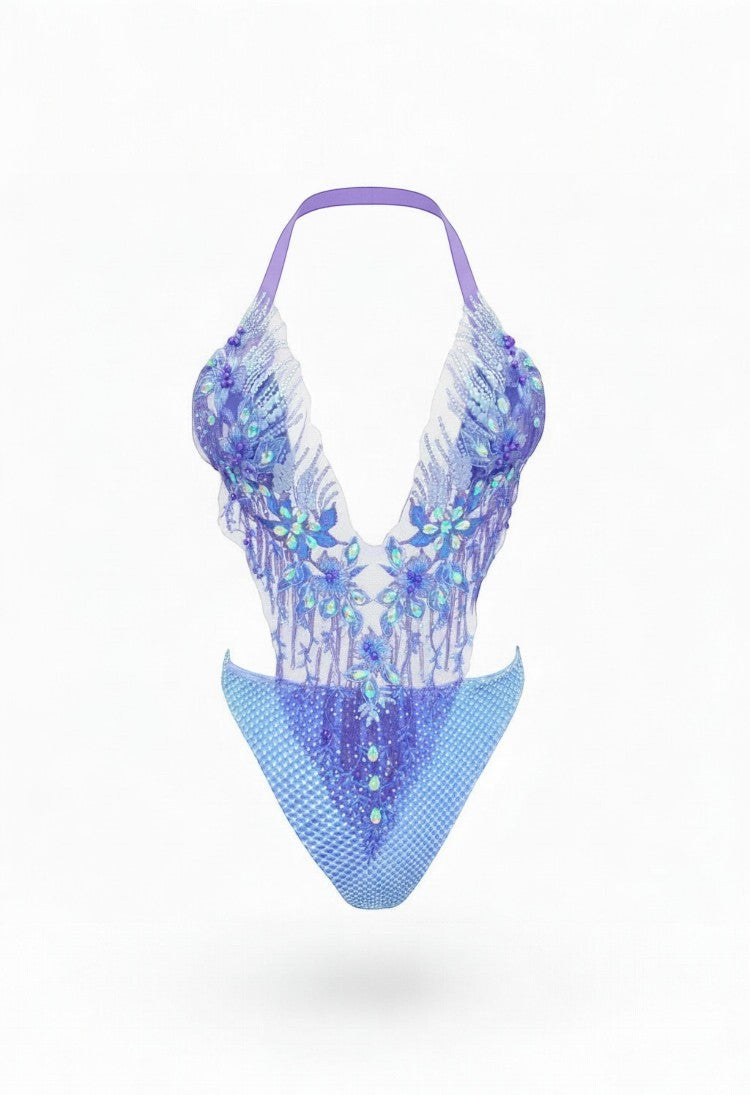 SlaySwimwear blue jeweled one-piece swimsuit with adjustable neck strap and pearl embellishments.