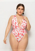 SlaySwimwear white and coral cheetah print one-piece swimsuit with halter neckline and tie waist, plus size