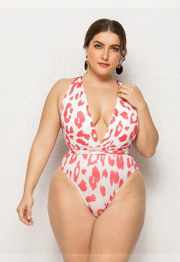 SlaySwimwear white and coral cheetah print one-piece swimsuit with halter neckline and tie waist, plus size