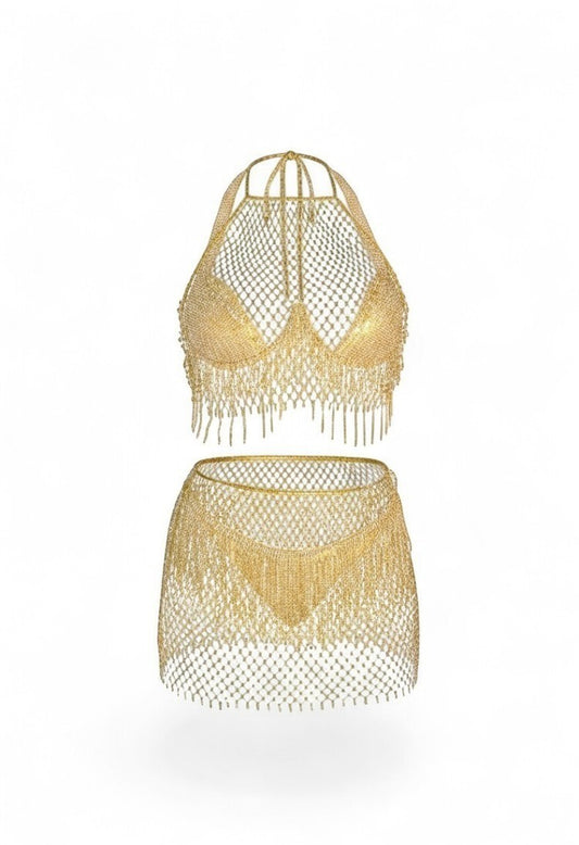 SlaySwimwear gold chainmail bikini set with halter top, bottoms, and fringe skirt.