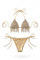 SlaySwimwear gold metallic fringe bikini set with crystal embellishments and tie sides. 80% Nylon, 20% Spandex.