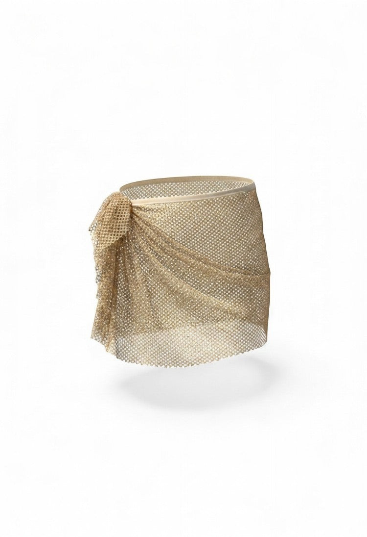 SlaySwimwear gold sparkling mesh wrap mini skirt with rhinestone closure and tie detail.