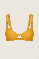 SlaySwimwear Golden Gem bikini top in mustard yellow with jeweled straps and gold hardware.