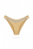 SlaySwimwear Honey Gold bikini bottoms with shimmering metallic fabric and rhinestone details on the waistband.