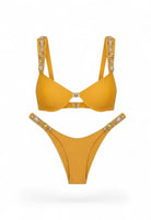 SlaySwimwear marigold yellow embellished bikini set with rhinestone and bead detailing on straps and hips.