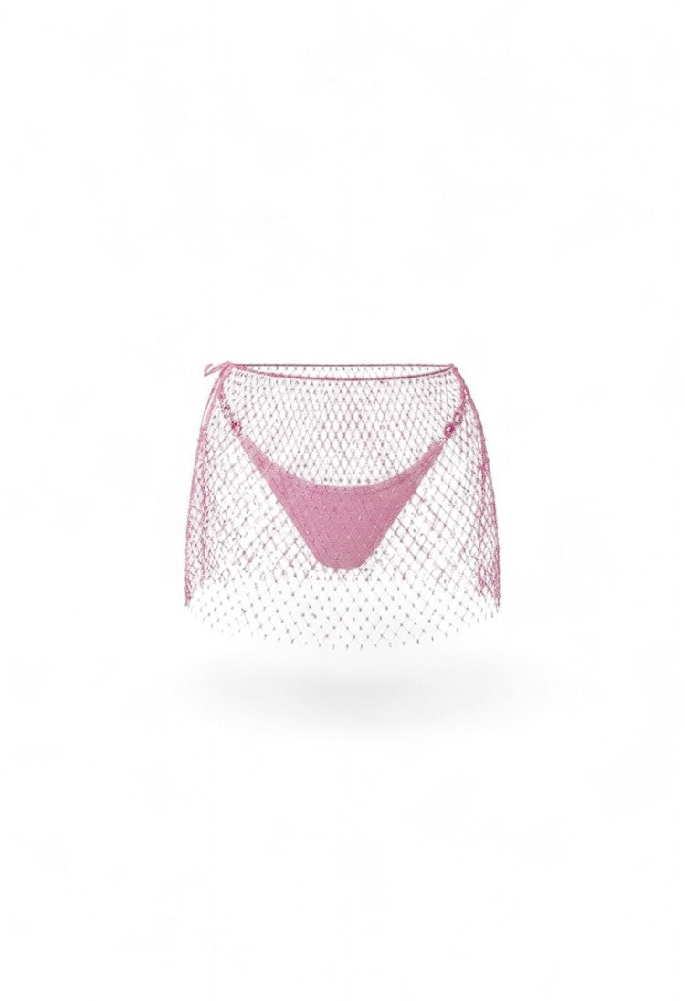 SlaySwimwear pink rhinestone halter bikini set with fishnet overlay and matching mini skirt.