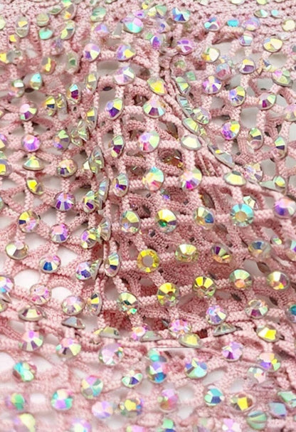 SlaySwimwear pink mesh wrap skirt with iridescent rhinestones, adjustable fit, perfect for beach or pool.