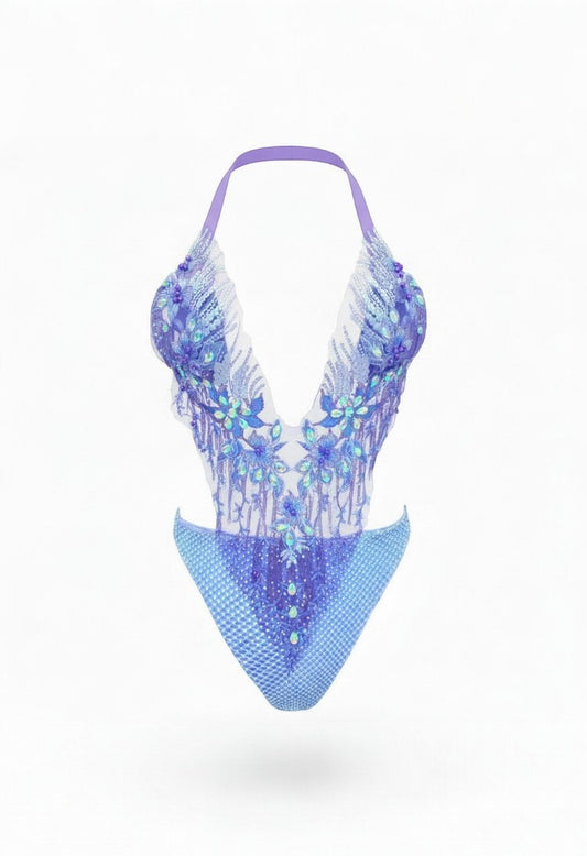 SlaySwimwear p jeweled one-piece swimsuit with adjustable halter neck and intricate rhinestone and pearl embellishments.urple