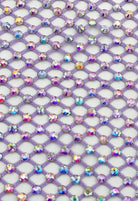 SlaySwimwear purple mesh wrap skirt with iridescent rhinestones, adjustable fit, perfect for beach or pool.
