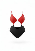 SlaySwimwear Queen Of Hearts red and black one-piece swimsuit with cut-outs and gold ring details.