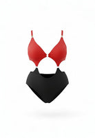 SlaySwimwear Queen Of Hearts red and black one-piece swimsuit with cut-outs and gold ring details. Made of 80% nylon and 20% spandex.