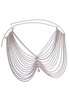 SlaySwimwear rhinestone body chain skirt with draped chains and a single teardrop gem accent. Silver metal and rhinestones.