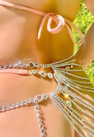 SlaySwimwear rhinestone body chain skirt with silver chain accents and durable clasps. Versatile piece can be worn as a skirt or chest piece.