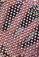 SlaySwimwear black mini skirt with all-over iridescent rhinestone embellishments and clasp closure.
