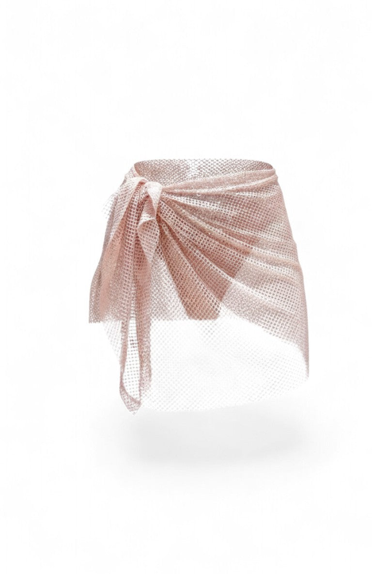 SlaySwimwear rose gold rhinestone mini skirt with feather-like embellishments and a mesh wrap tie closure.