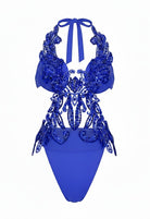 SlaySwimwear royal blue one piece swimsuit with plunge halter neck and ornate rhinestone & sequin applique. High-cut legs.