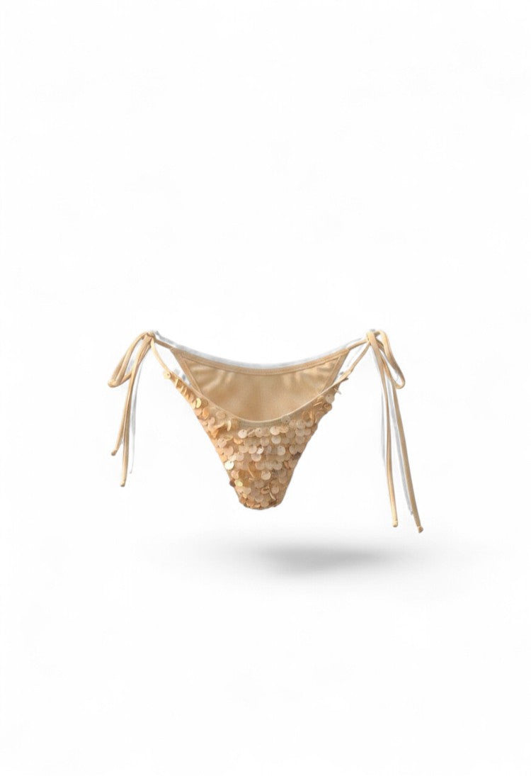 SlaySwimwear Shelly bikini set with shell embellishments in champagne. Triangle top and tie-side bottoms.