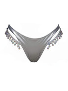 SlaySwimwear silver bikini bottoms with rhinestone crystal embellishments on the sides.