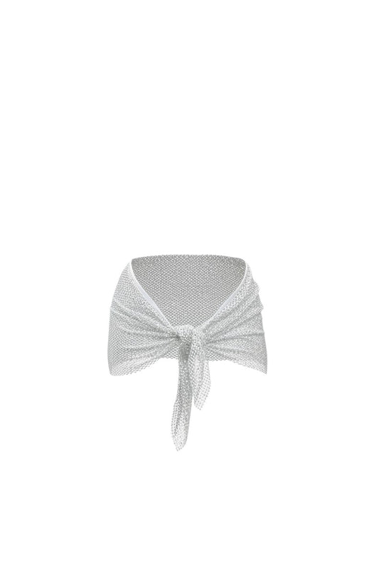 SlaySwimwear silver rhinestone tie-waist mini skirt with a mint green swimsuit underneath, styled by a model poolside.