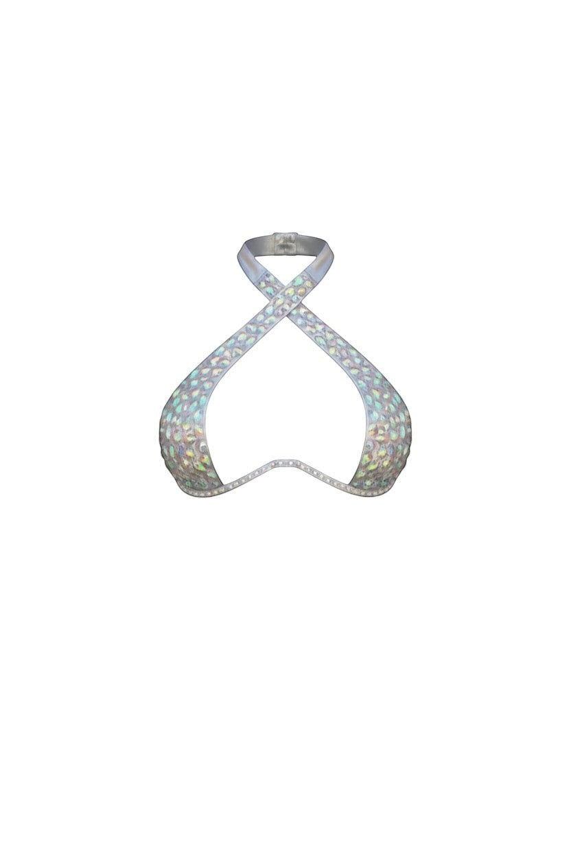 SlaySwimwear silver halter bikini top with criss-cross straps and sparkling embellishments.
