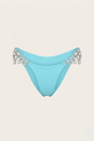 SlaySwimwear turquoise bikini bottoms with sparkling rhinestone embellishments on the sides.