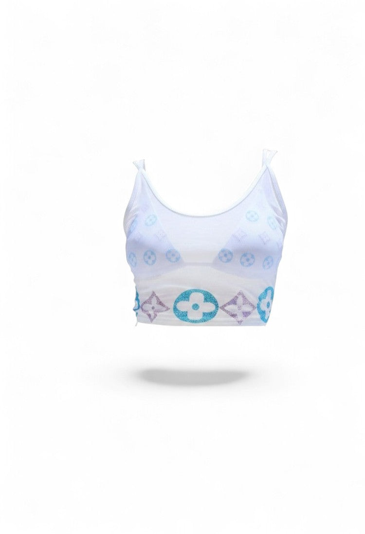 SlaySwimwear white sheer mesh crop top with rhinestone motif and matching bikini bottom and sarong skirt.